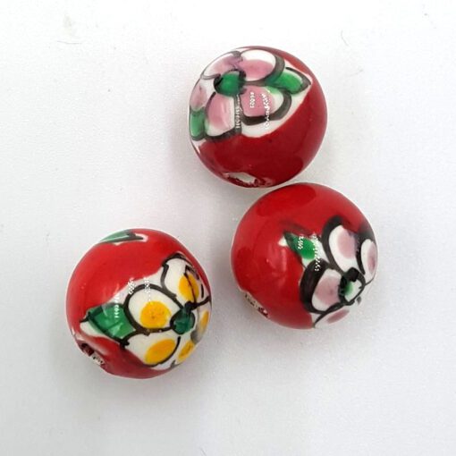 Keramieken kralen 14mm rood met bloemetjes