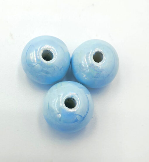 Keramieken kralen licht blauw 16x14mm met glans