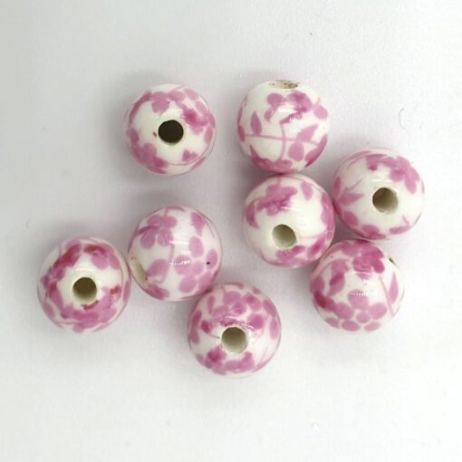 Keramiek kralen 8mm wit met roze bloemetjes