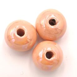 Kralen keramiek 12x16mm peach met olieglans