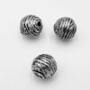 Metallook kraal Rond 11mm met streepjes antiek zilver