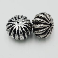Metallook kraal rond plat 16x12mm antiek zilver