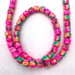 Polymeer tube kralen fuchsia roze met bloemetjes 6mm